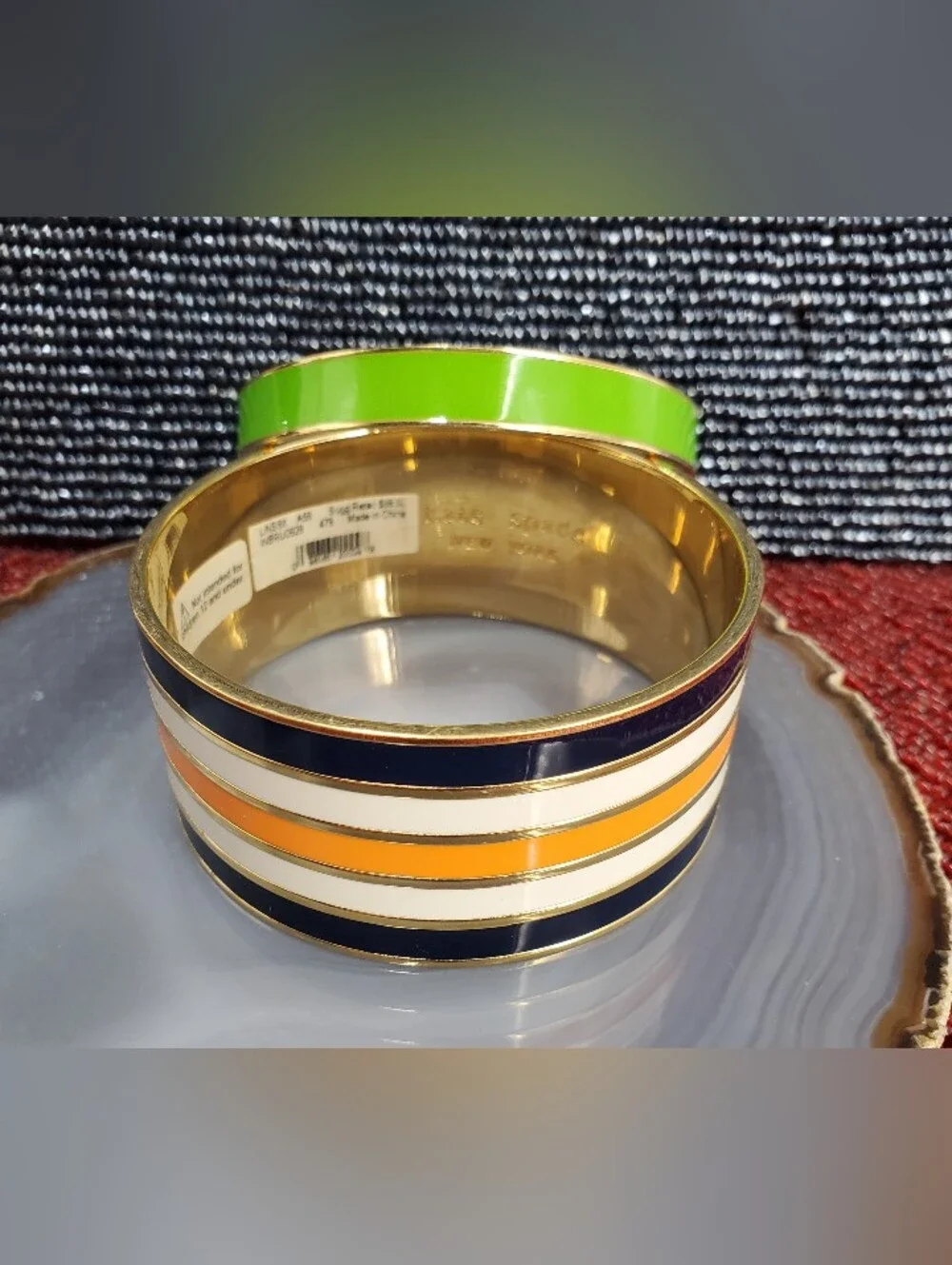 Two vibrant enamel and gold-plated bangle bracelets from Kate Spade New York. - Picture 3 of 17